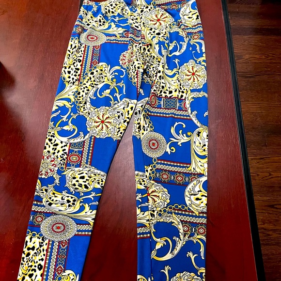 Leopard and Gold chains print leggings, like new. - Picture 2 of 3